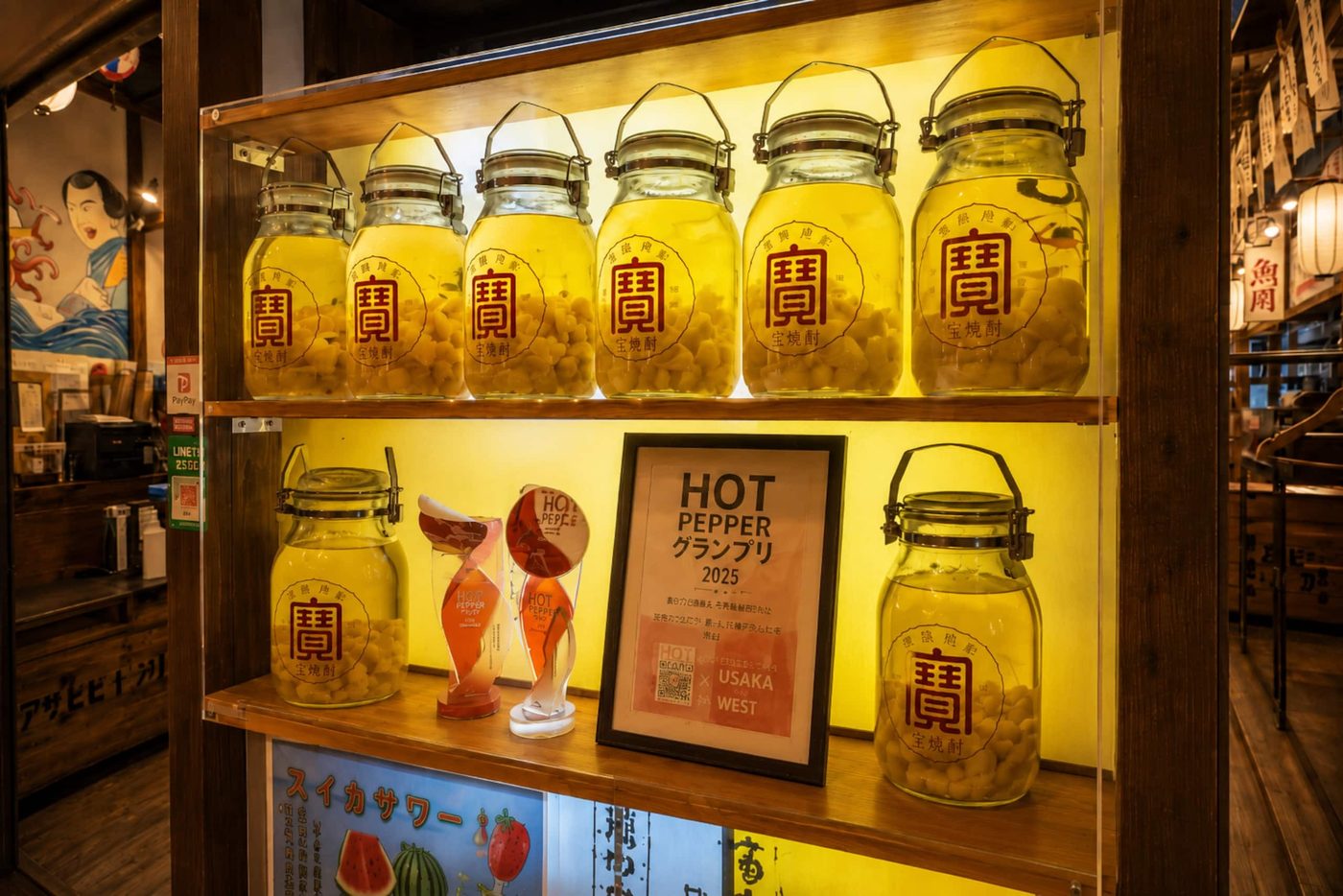 Shelves of house-made plum liqueur jars